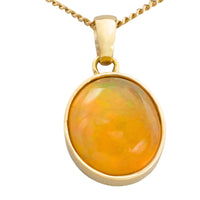 Orange opal pendant in 14 carat gold