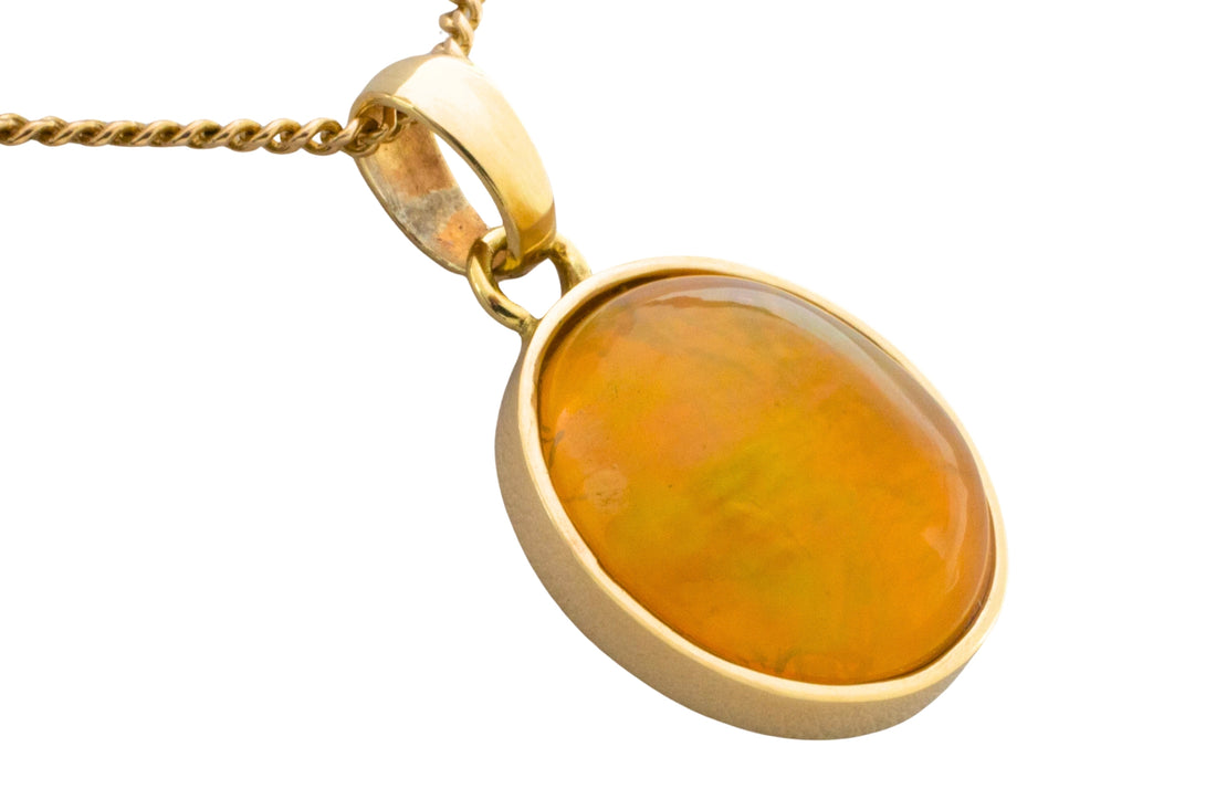 Orange opal pendant in 14 carat gold