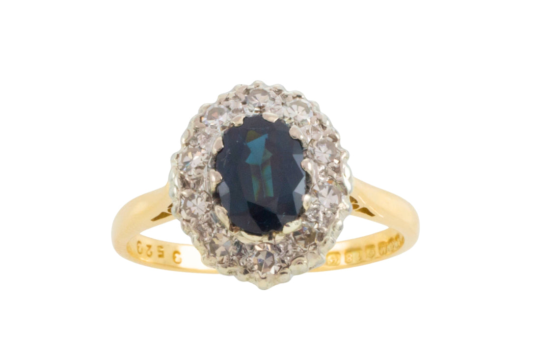 Vintage sapphire and diamond clsuter ring in 18 carat gold