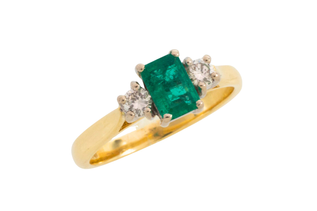 Emerald and diamond trilogy ring