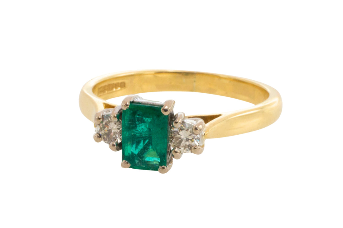 Emerald and diamond trilogy ring