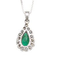 White gold emerald and diamond pendant