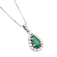 White gold emerald and diamond pendant