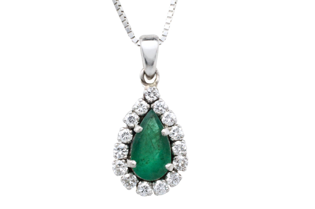 White gold emerald and diamond pendant