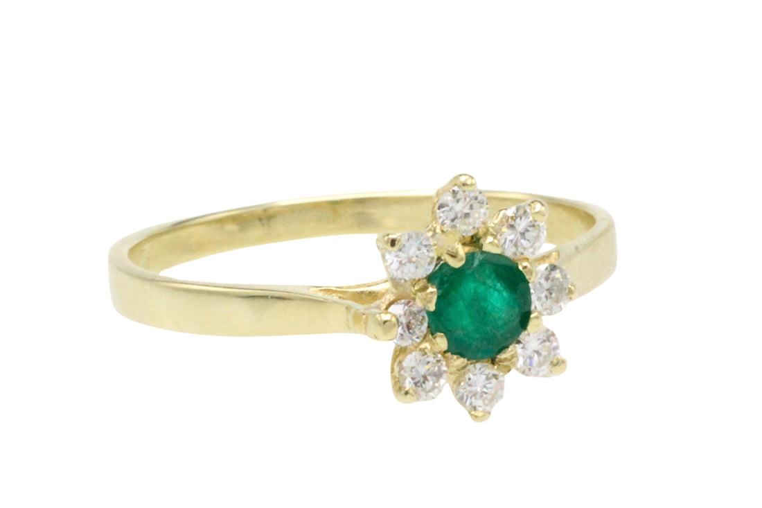 Emerald and diamond cluster ring