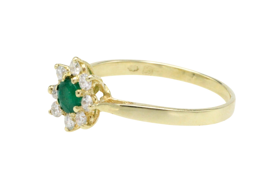 Emerald and diamond cluster ring
