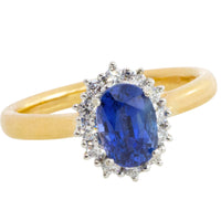 Saffier en diamanten cluster ring van 18 karaat goud