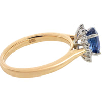 Saffier en diamanten cluster ring van 18 karaat goud