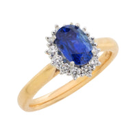 Saffier en diamanten cluster ring van 18 karaat goud