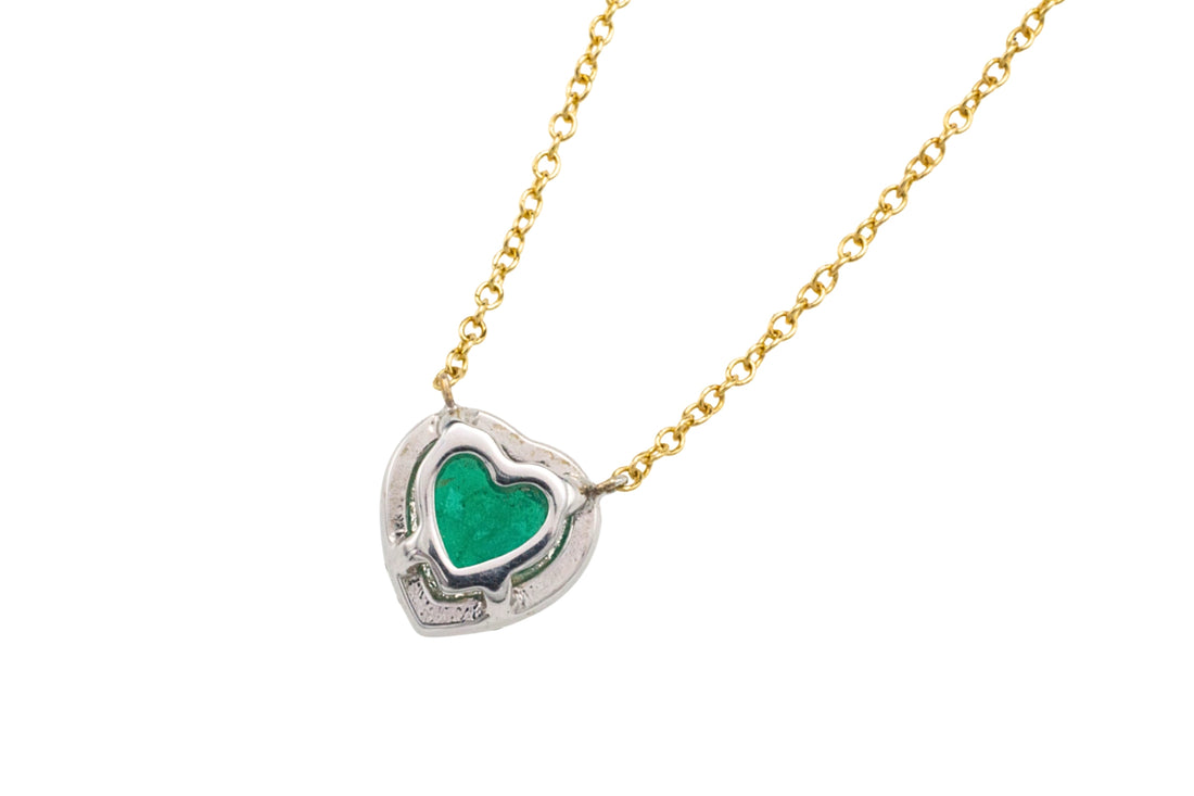Emerald and diamond heart pendant in 18 carat gold
