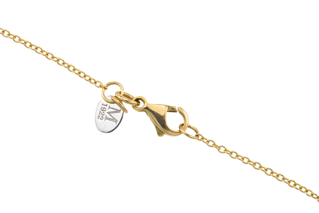 Emerald and diamond heart pendant in 18 carat gold