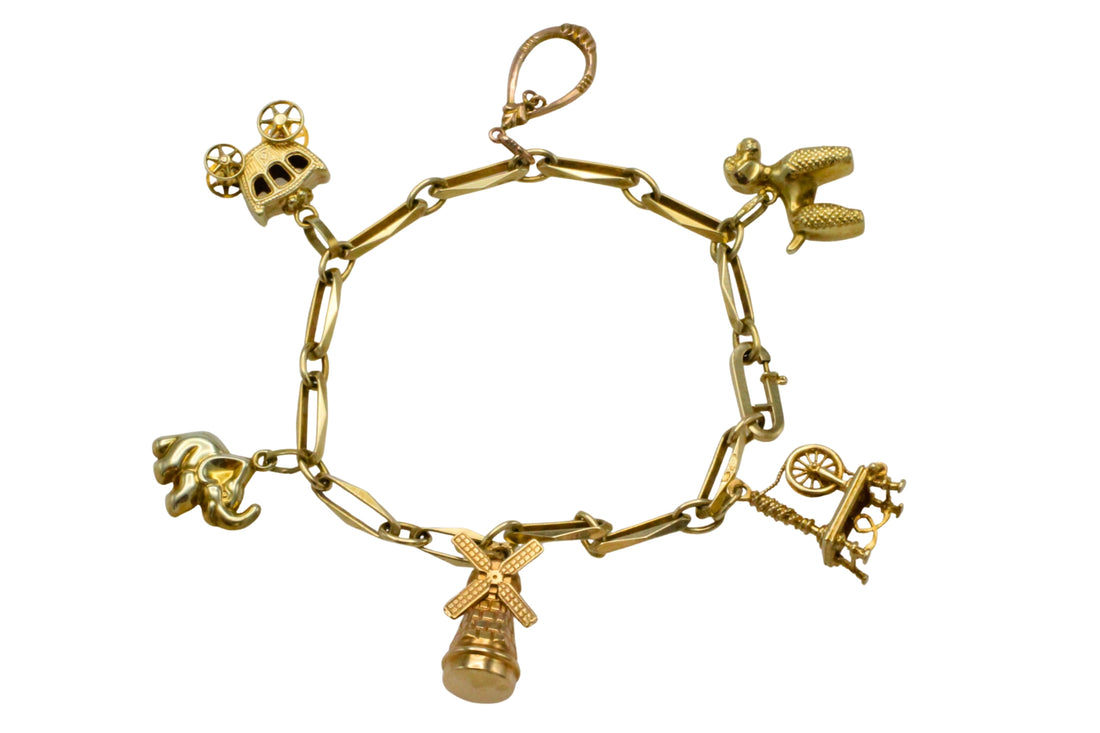 Vintage charm bracelet in 14 carat gold