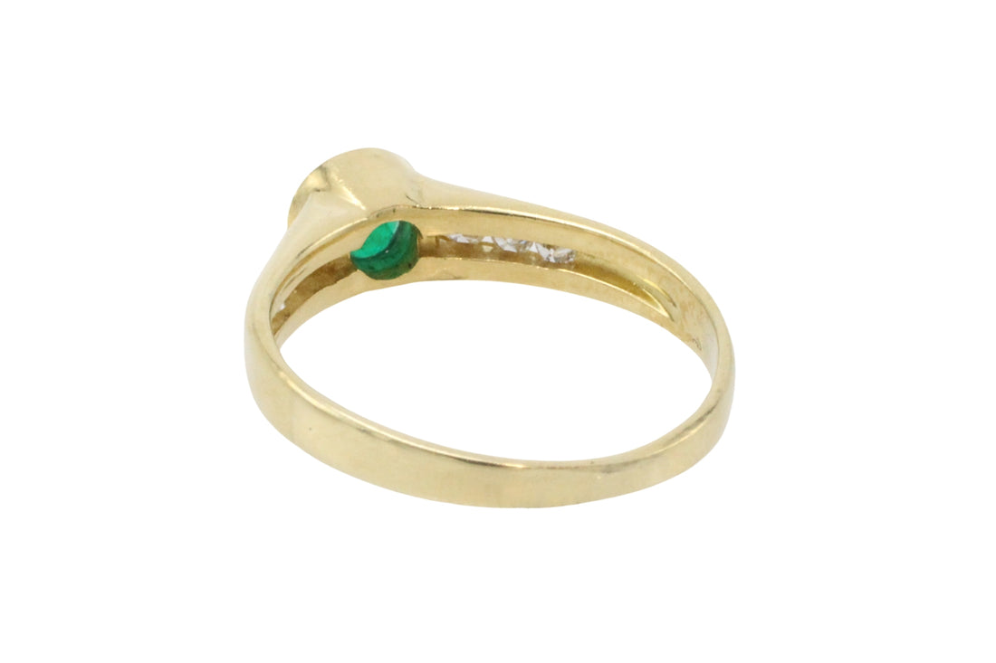 Emerald and diamond ring in 18 carat gold