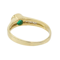 Emerald and diamond ring in 18 carat gold