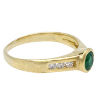 Emerald and diamond ring in 18 carat gold
