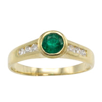 Emerald and diamond ring in 18 carat gold