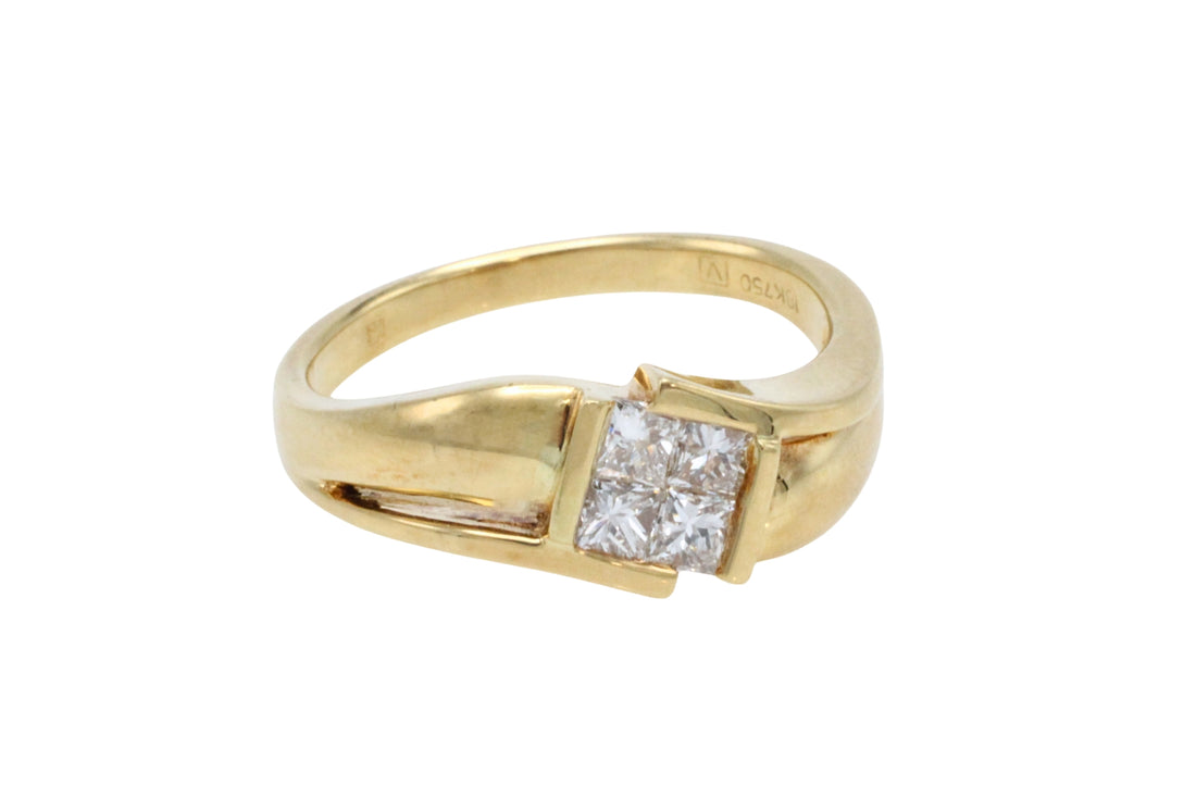 18 carat gold ring with princess cut diamonds