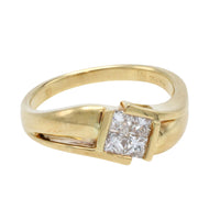 18 carat gold ring with princess cut diamonds