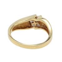 18 carat gold ring with princess cut diamonds