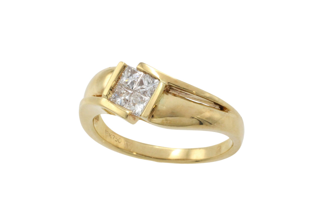 18 carat gold ring with princess cut diamonds