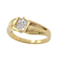 18 carat gold ring with princess cut diamonds