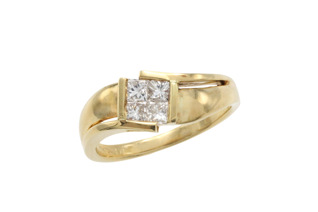 18 carat gold ring with princess cut diamonds