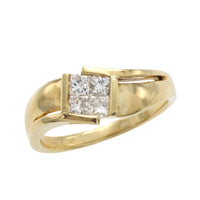 18 carat gold ring with princess cut diamonds