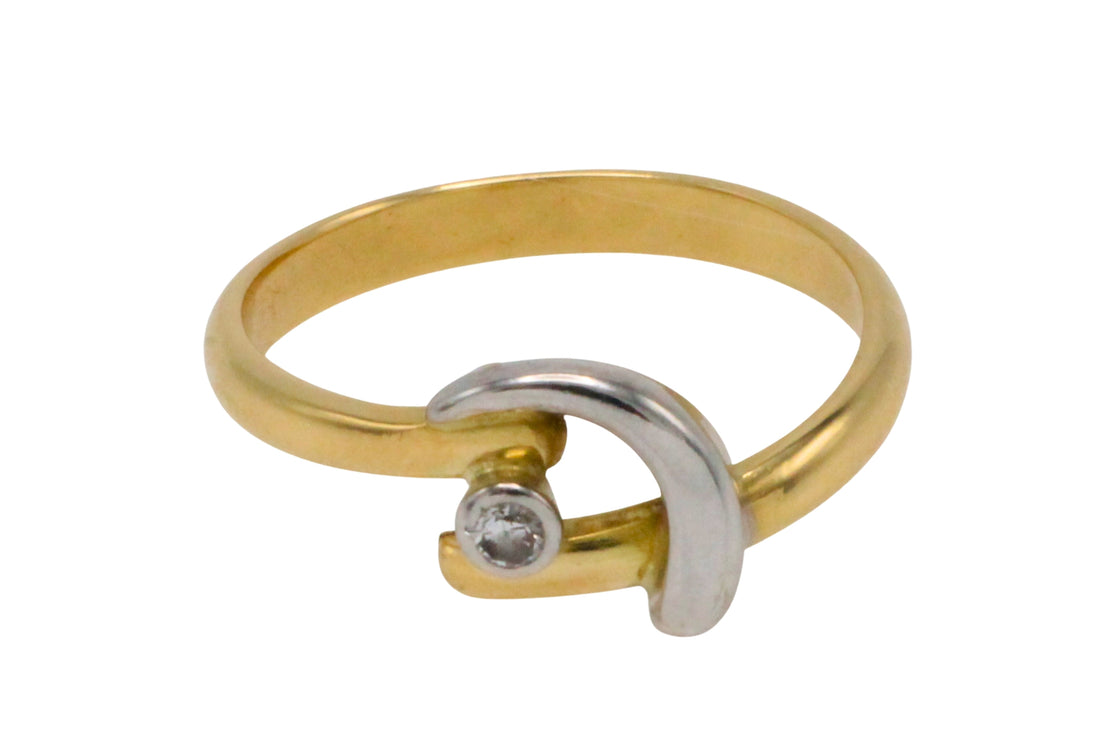 18 carat white and yellow gold diamond ring