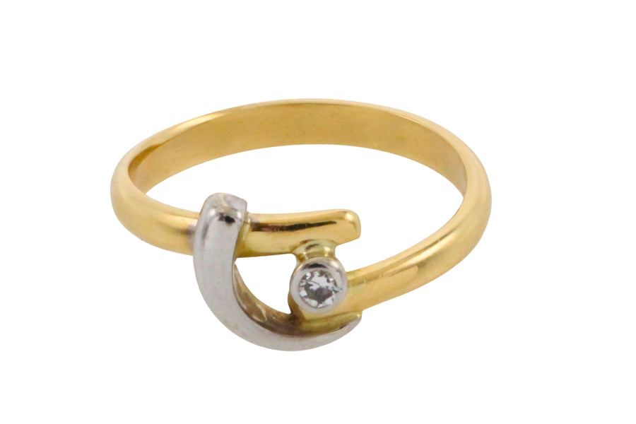 18 carat white and yellow gold diamond ring