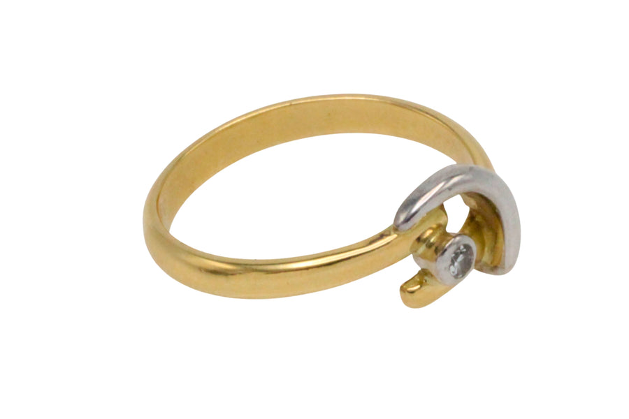 18 carat white and yellow gold diamond ring