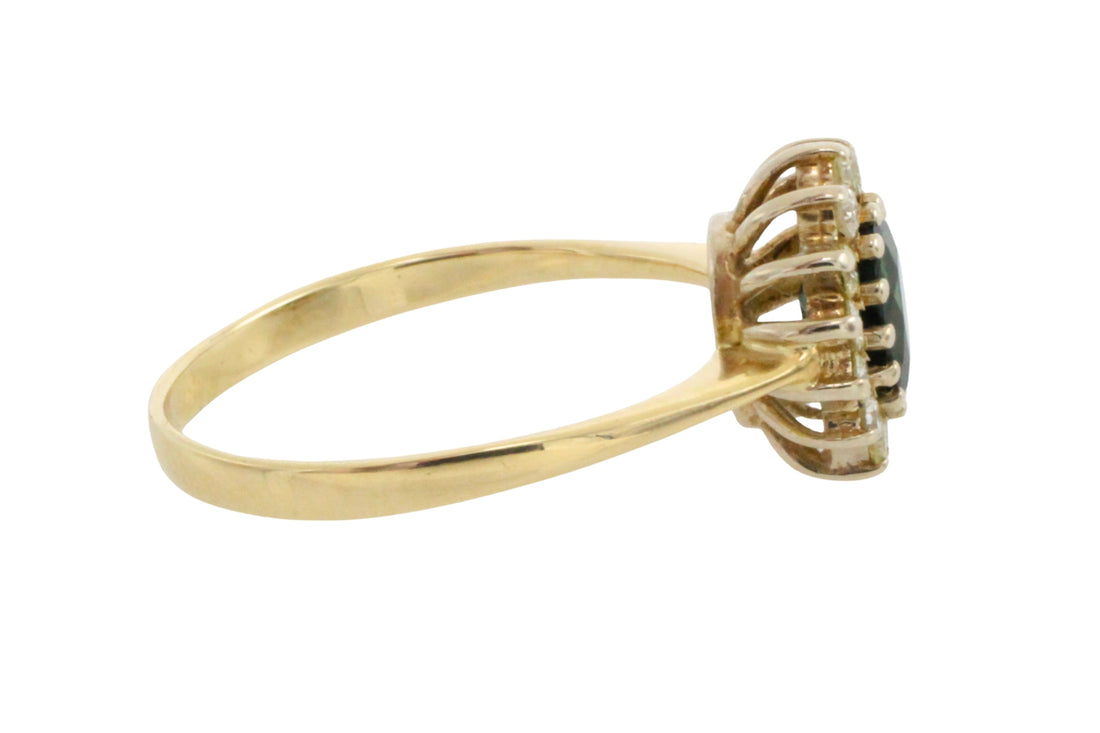 Sapphire and diamond cluster ring in 14 carat gold