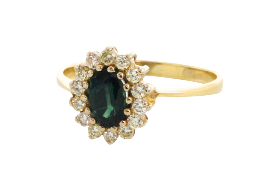 Sapphire and diamond cluster ring in 14 carat gold