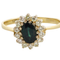 Sapphire and diamond cluster ring in 14 carat gold