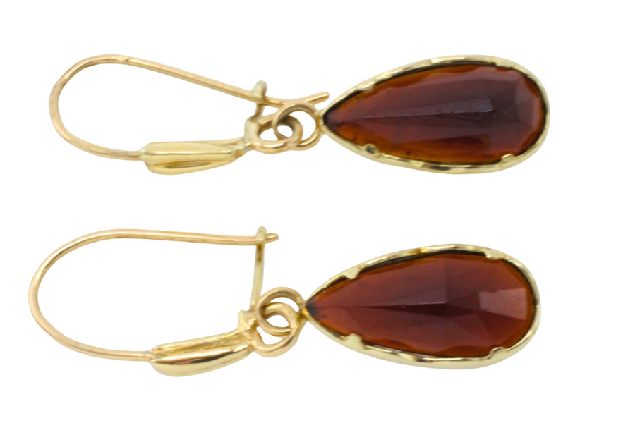 Garnet pendant earrings in 14 carat gold