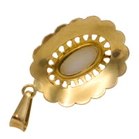 White opal pendant in 14 carat gold