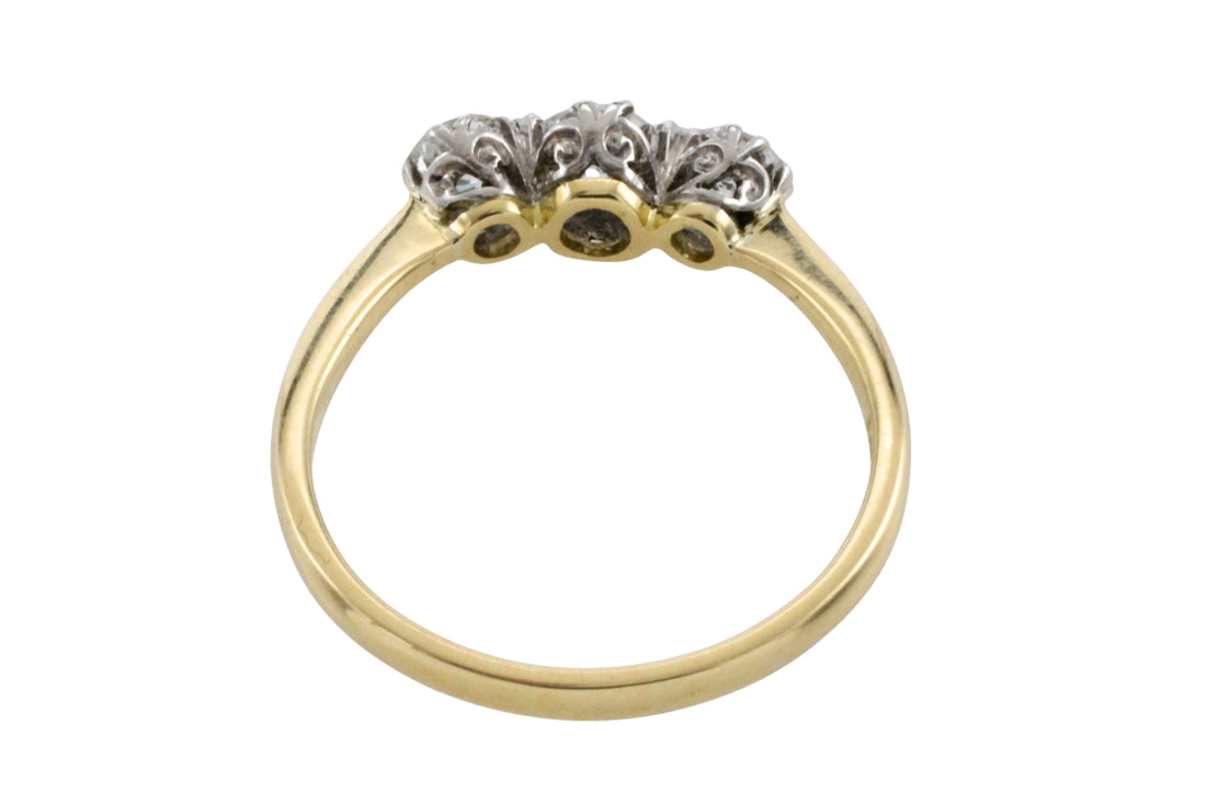 Three stone diamond ring in 18 carat gold