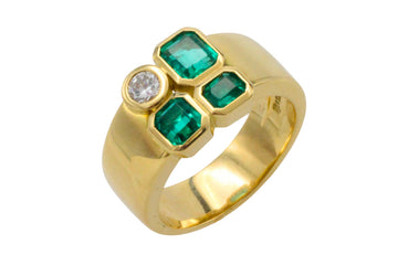 Emerald and diamond ring in 18 carat gold