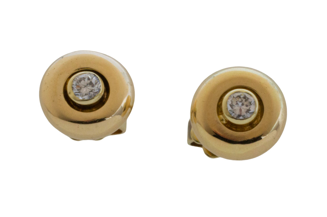 Diamond button studs in 14 carat gold