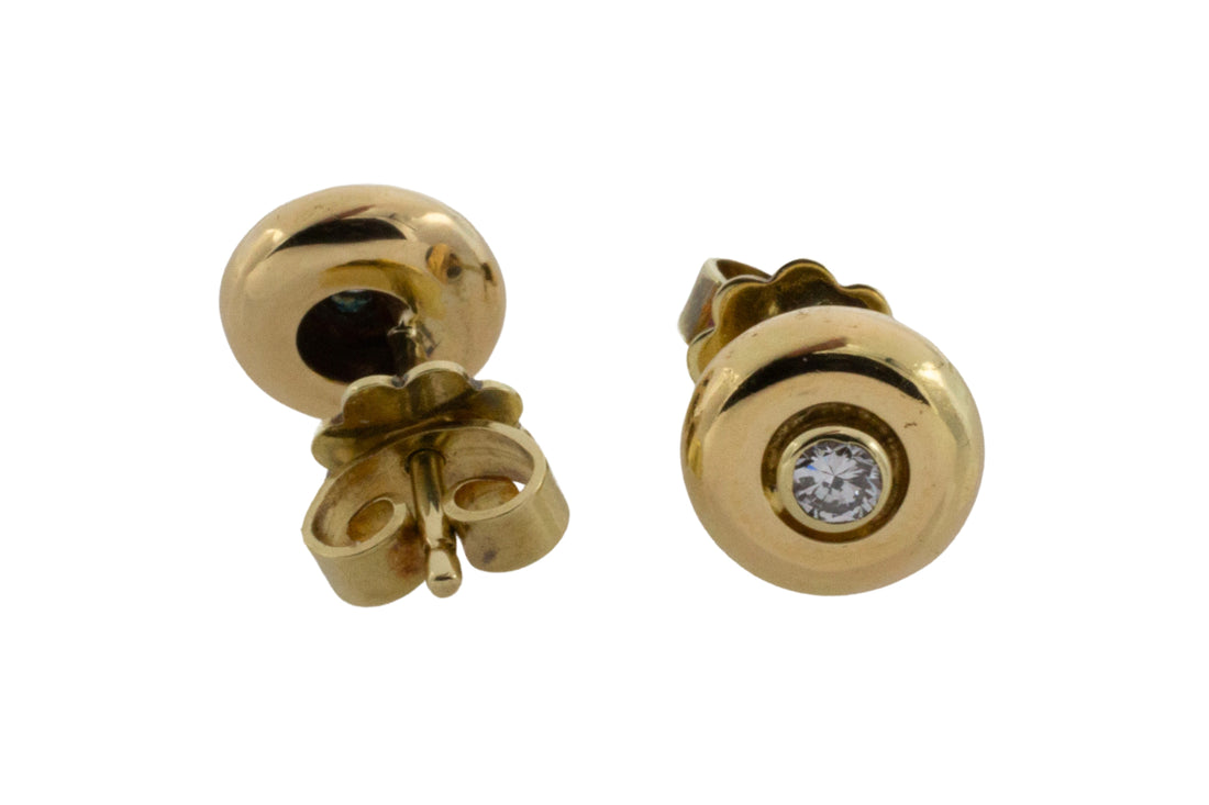 Diamond button studs in 14 carat gold