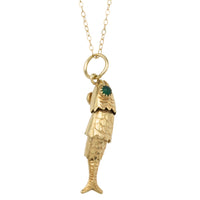 Vintage 14 carat gold fish pendant with chrysoprase eyes