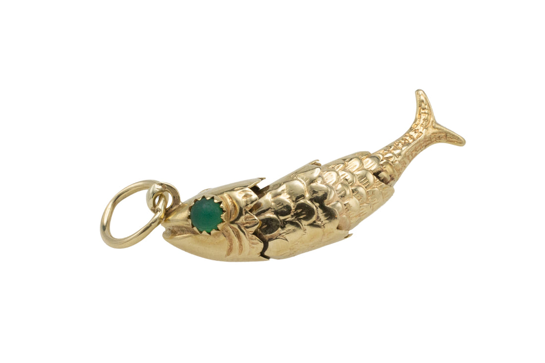 Vintage 14 carat gold fish pendant with chrysoprase eyes