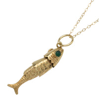 Vintage 14 carat gold fish pendant with chrysoprase eyes