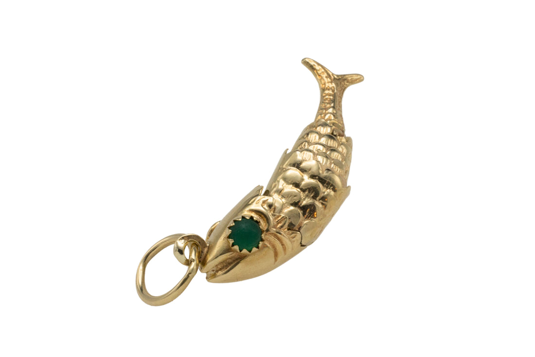 Vintage 14 carat gold fish pendant with chrysoprase eyes