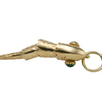 Vintage 14 carat gold fish pendant with chrysoprase eyes