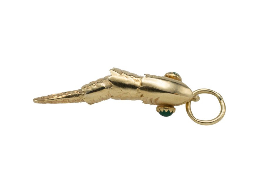 Vintage 14 carat gold fish pendant with chrysoprase eyes