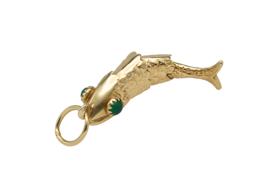 Vintage 14 carat gold fish pendant with chrysoprase eyes