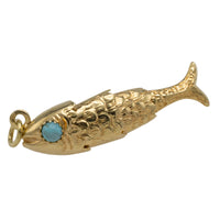 Vintage 14 carat gold fish pendant with turquoise eyes