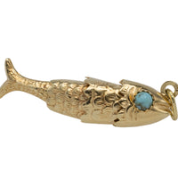 Vintage 14 carat gold fish pendant with turquoise eyes