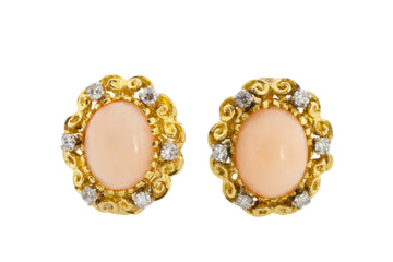 Angel skin and diamond earrings in 14 carat gold