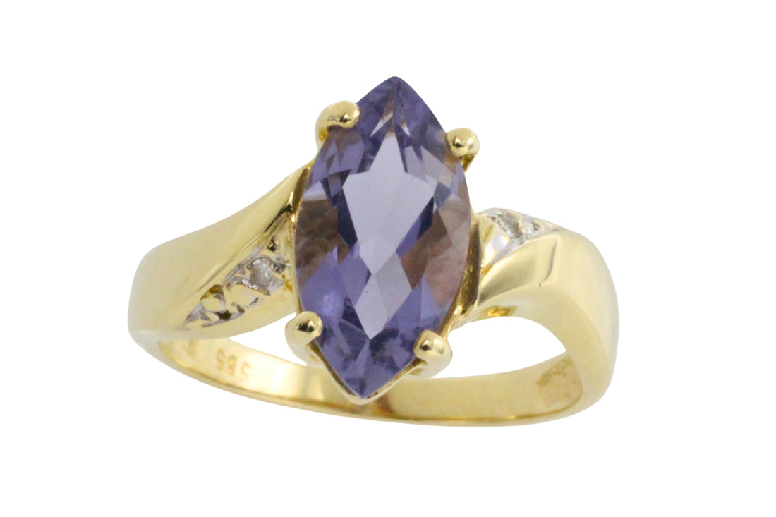 Iolite and diamond ring in 14 carat gold